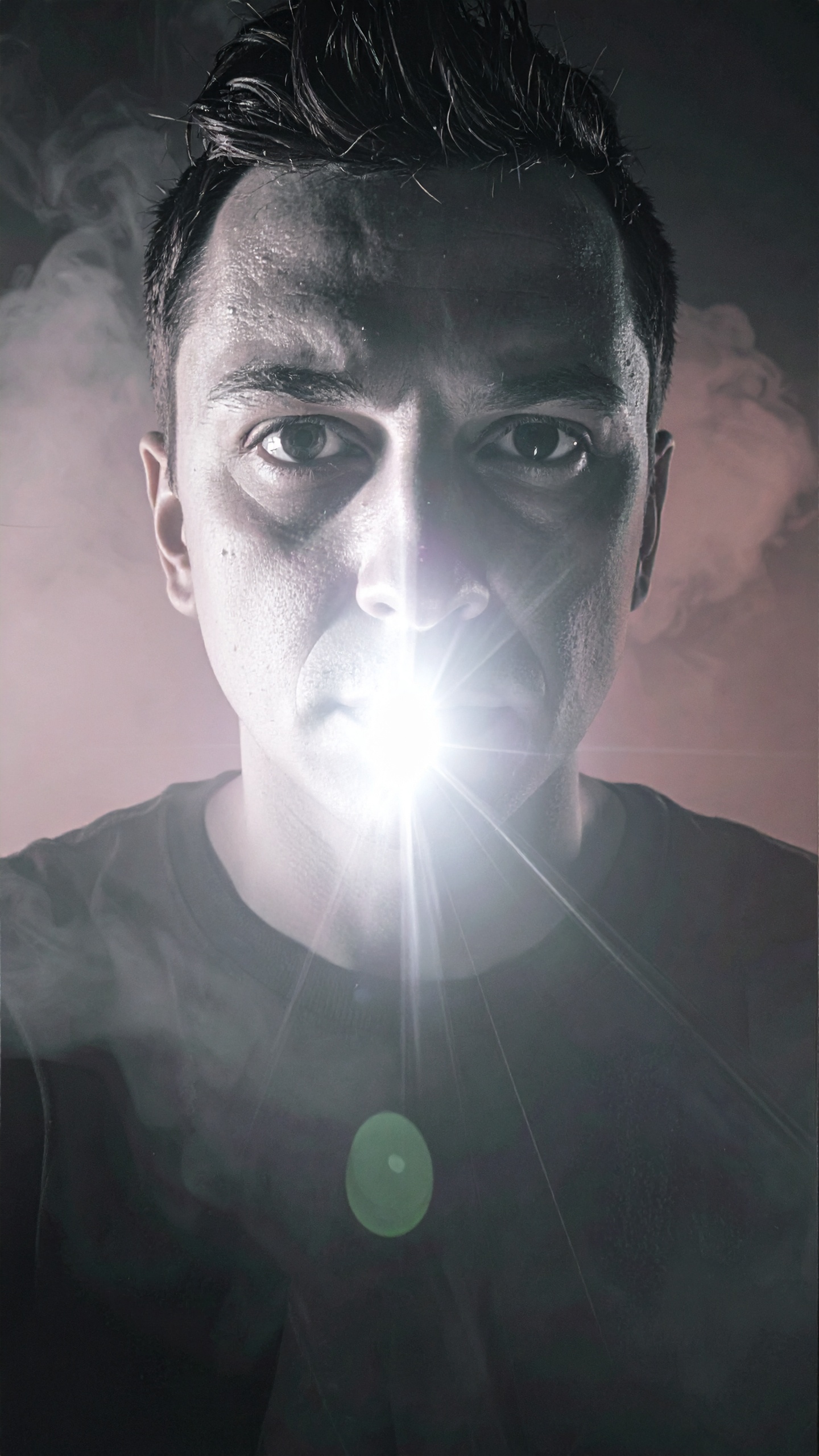 A dramatic portrait of a man with intense lighting effect creates a captivating focal point