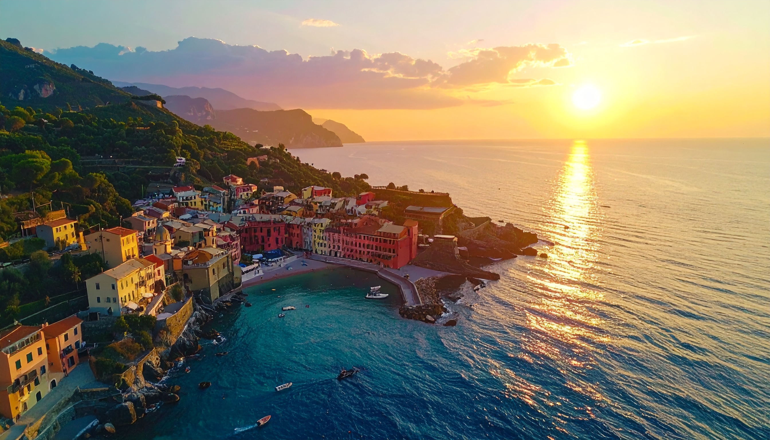 Aerial View of a Colorful Coastal Village at Sunset