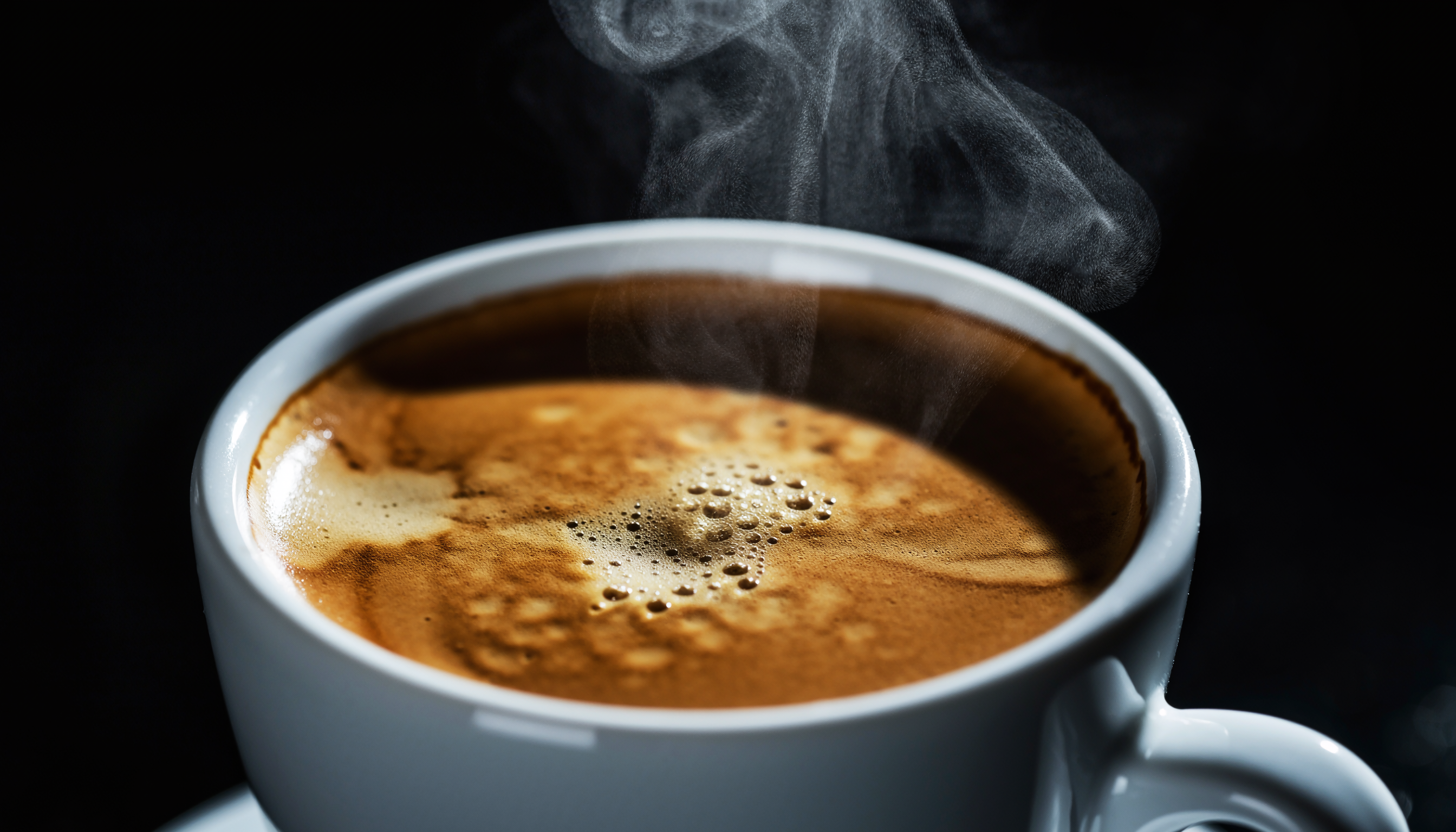 Steaming Espresso Coffee Cup Close-Up
