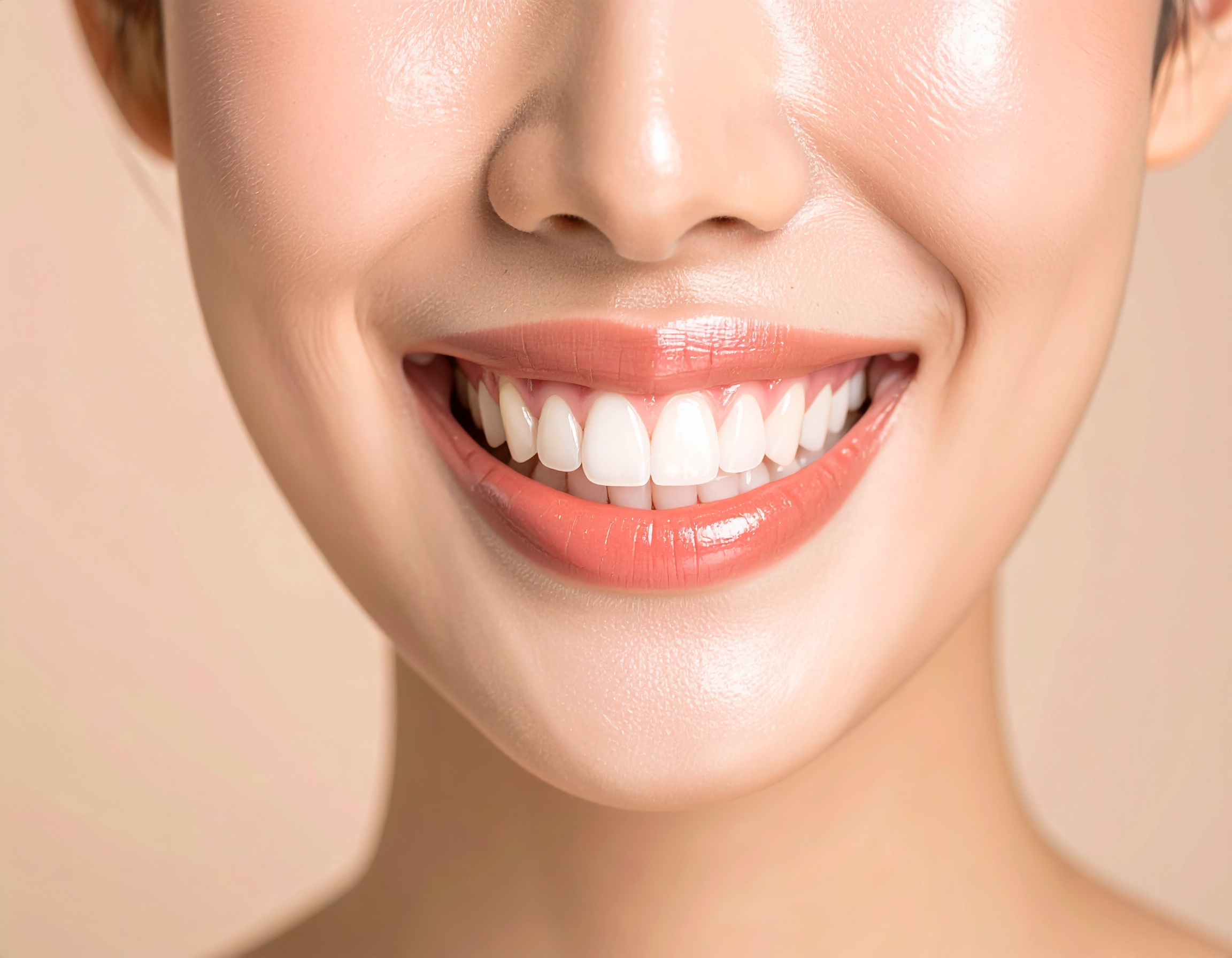 A close-up of a bright and healthy smile showcases well-aligned, white teeth