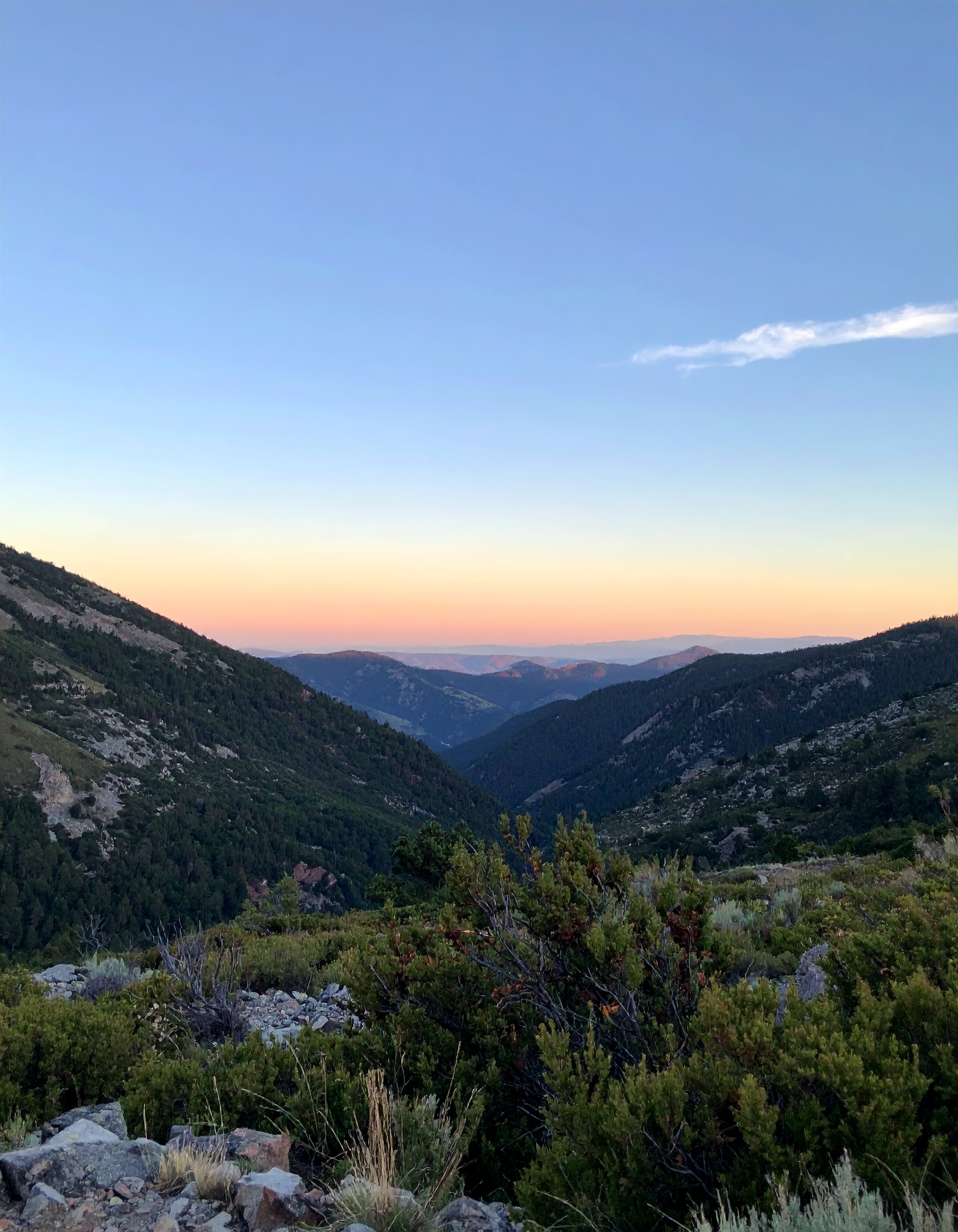 Mountain Landscape at Sunset with Vibrant Blue and Orange Sky