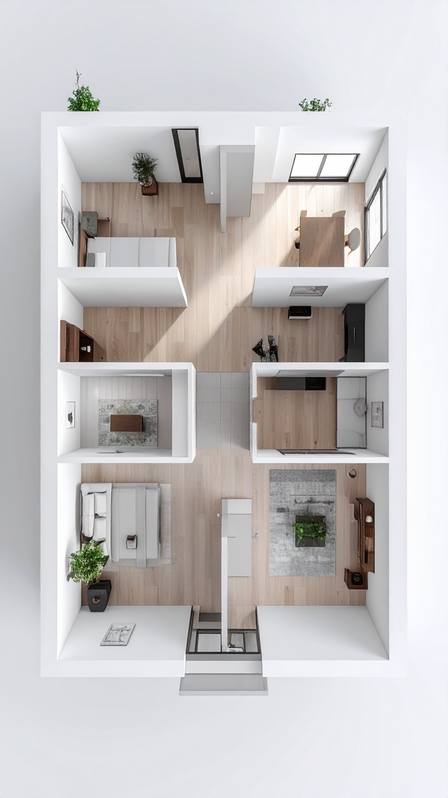 Top-down view of a modern minimalist apartment layout with natural light