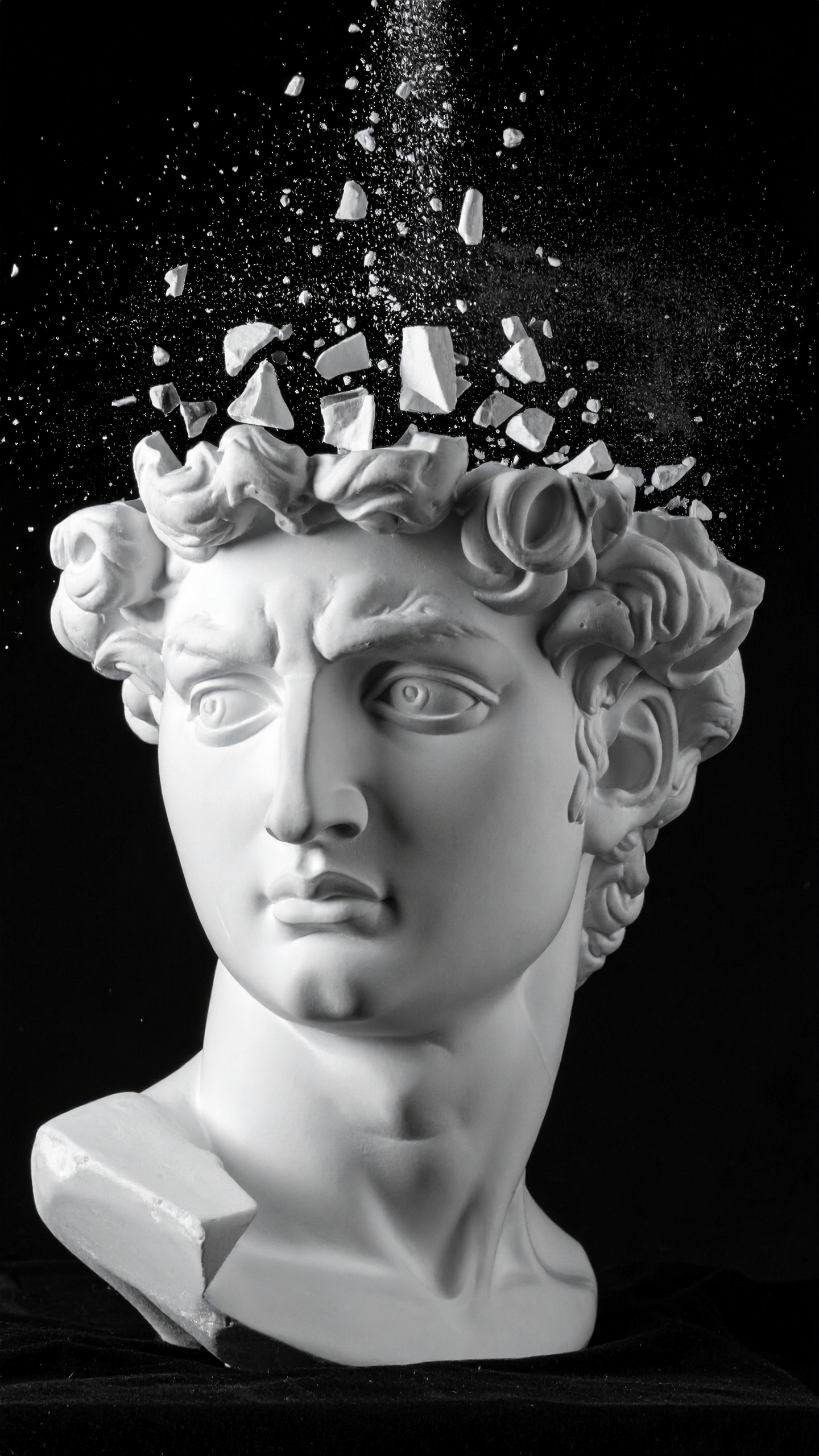 A classical bust with an exploded head effect symbolizes creativity and breaking boundaries