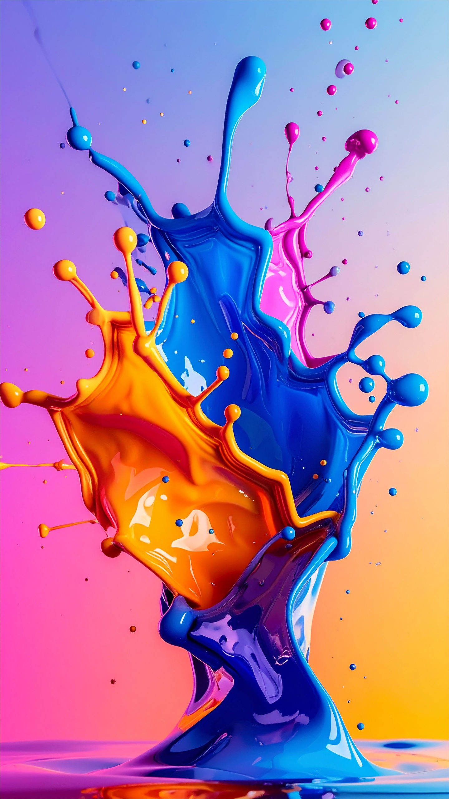 Vibrant splashes of blue, orange, and pink paint collide in mid-air