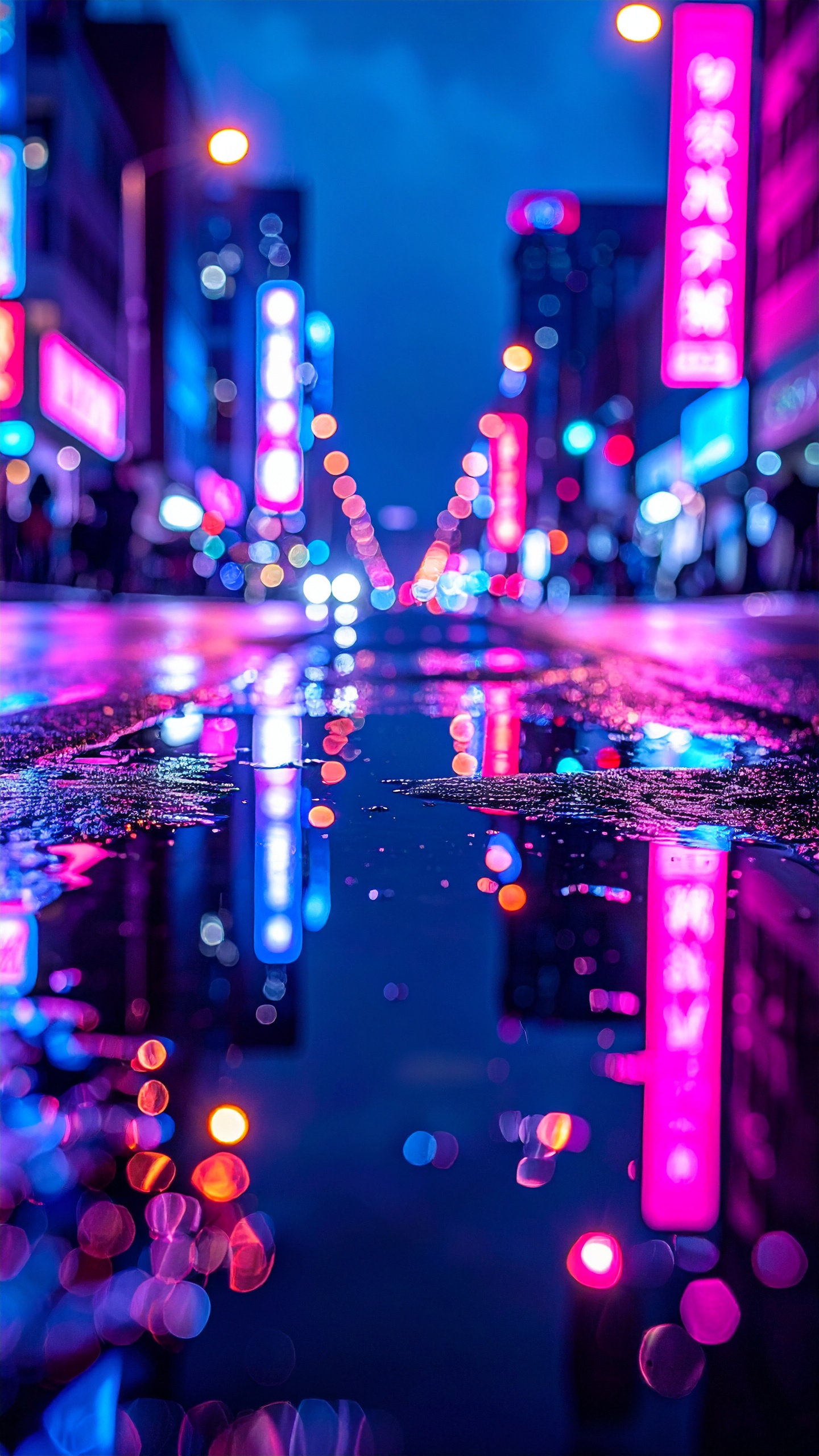 Urban Street at Night with Neon Reflections