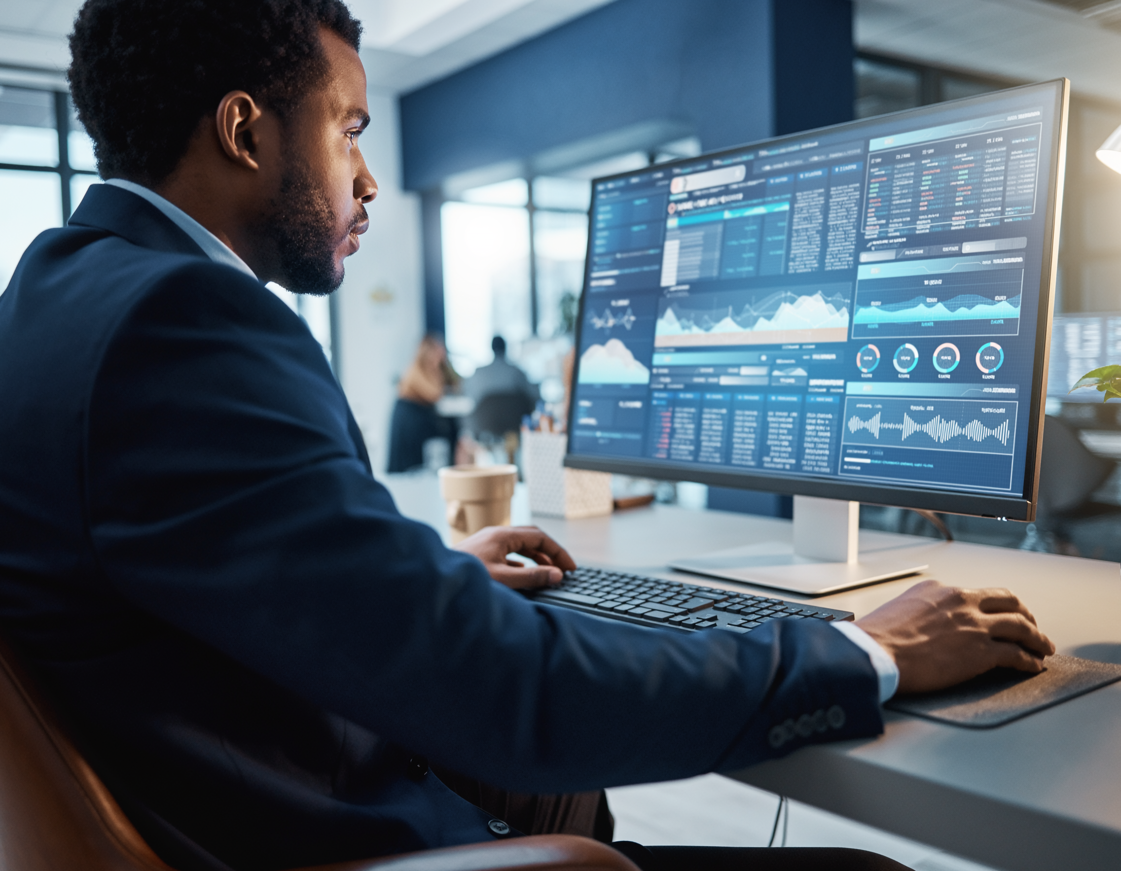 Businessman in Suit Working in Modern Office