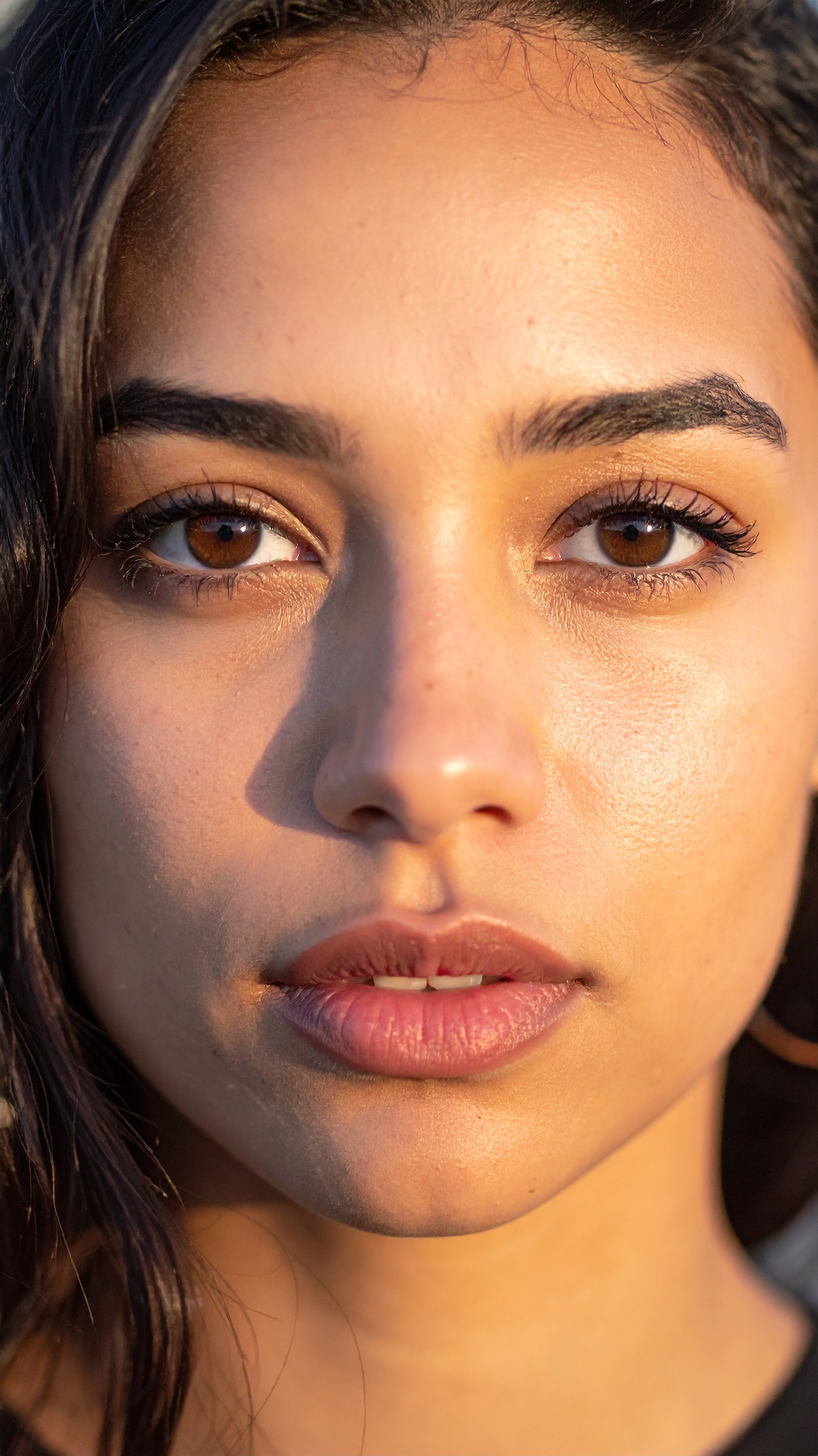 Close-up Face with Soft Lighting and Warm Skin Tones