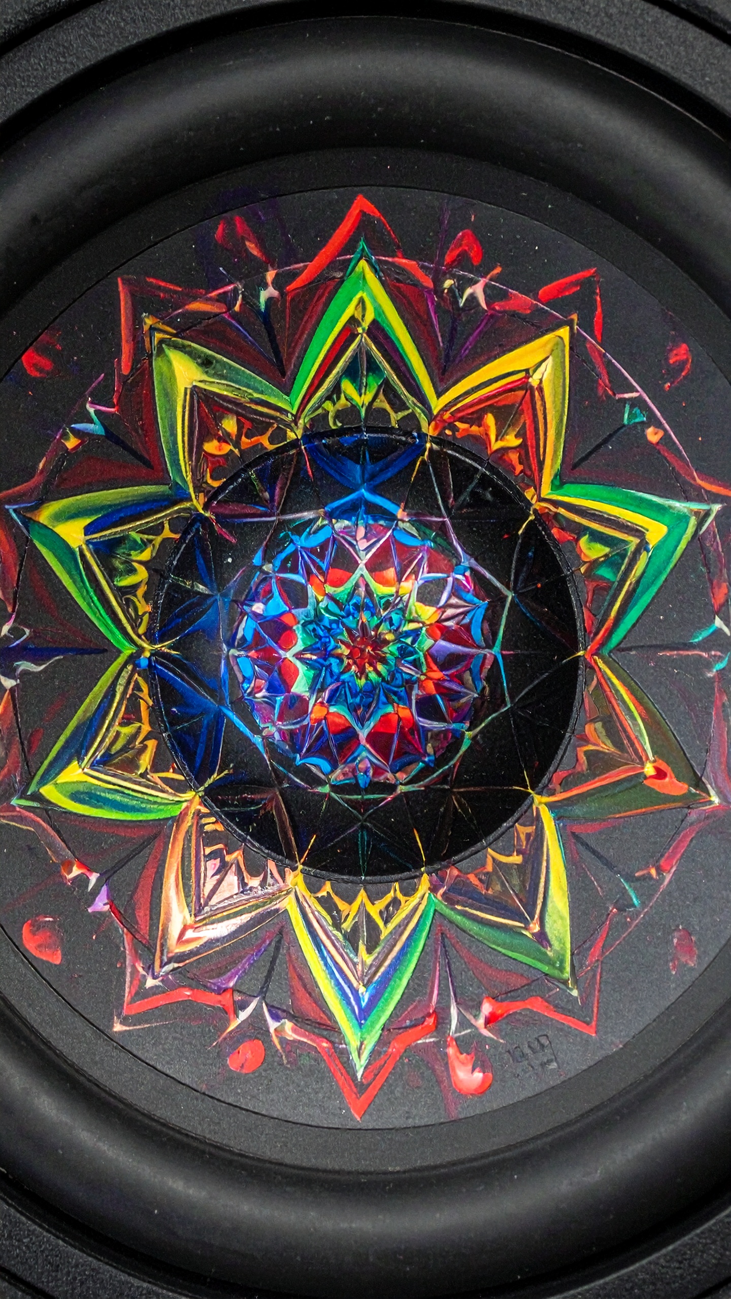 Vibrant kaleidoscope pattern featuring intricate geometric shapes