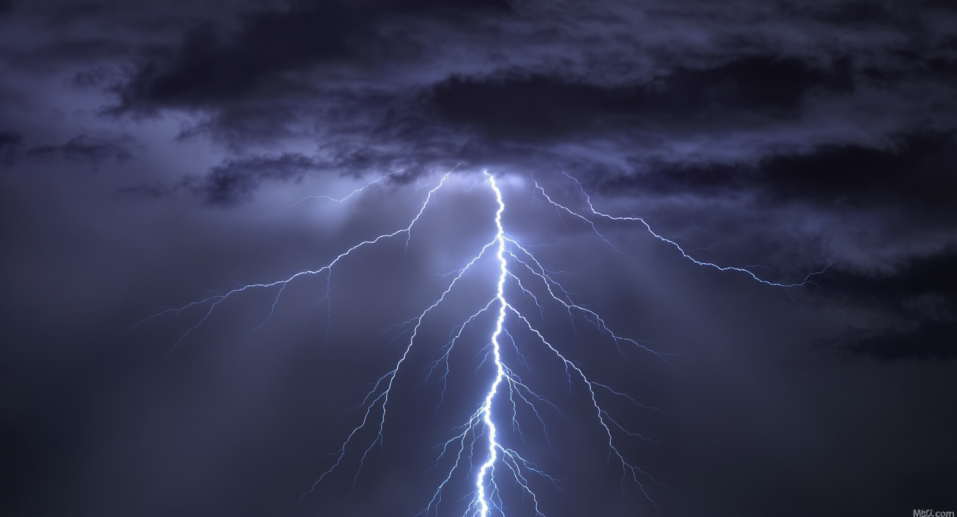 A powerful bolt of lightning pierces through a dark, stormy sky