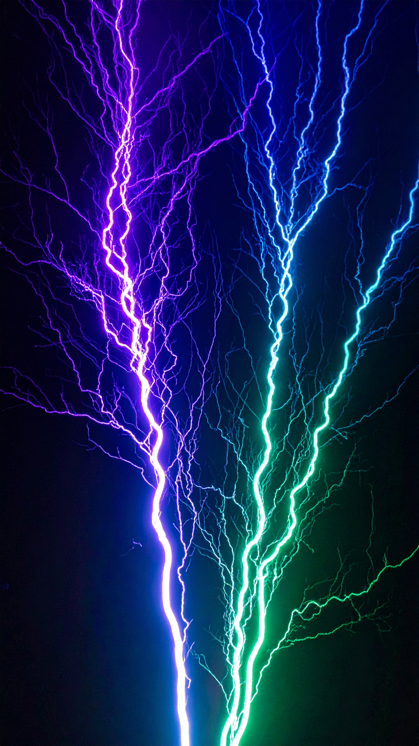 Vibrant electric light display with neon colors on black background